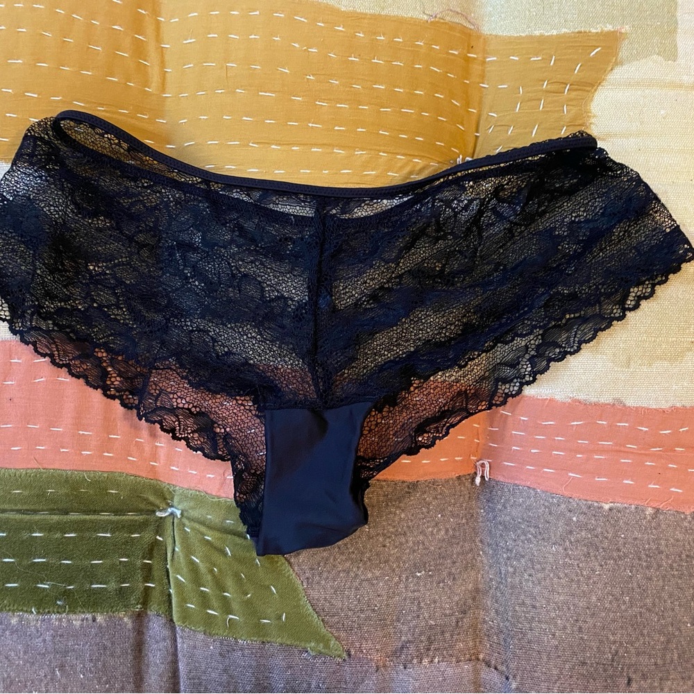 Black lacy Calvin Klein panties. Very sexy, never worn. Size Medium.